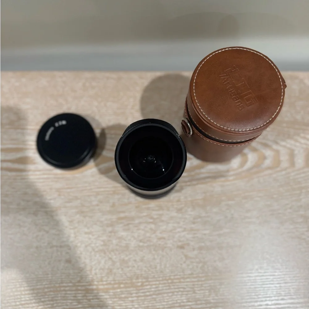 Black Camera Lens with Brown Case